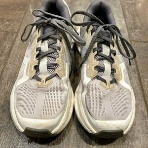 On Running  Gray and White Athletic Shoes
